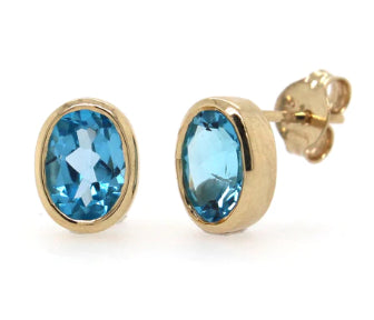 9Ct Yellow Gold Oval Blue Topaz Earrings